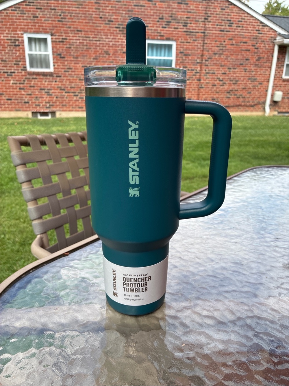 40oz Stanley Tumbler in blue/green color. Straw Attached